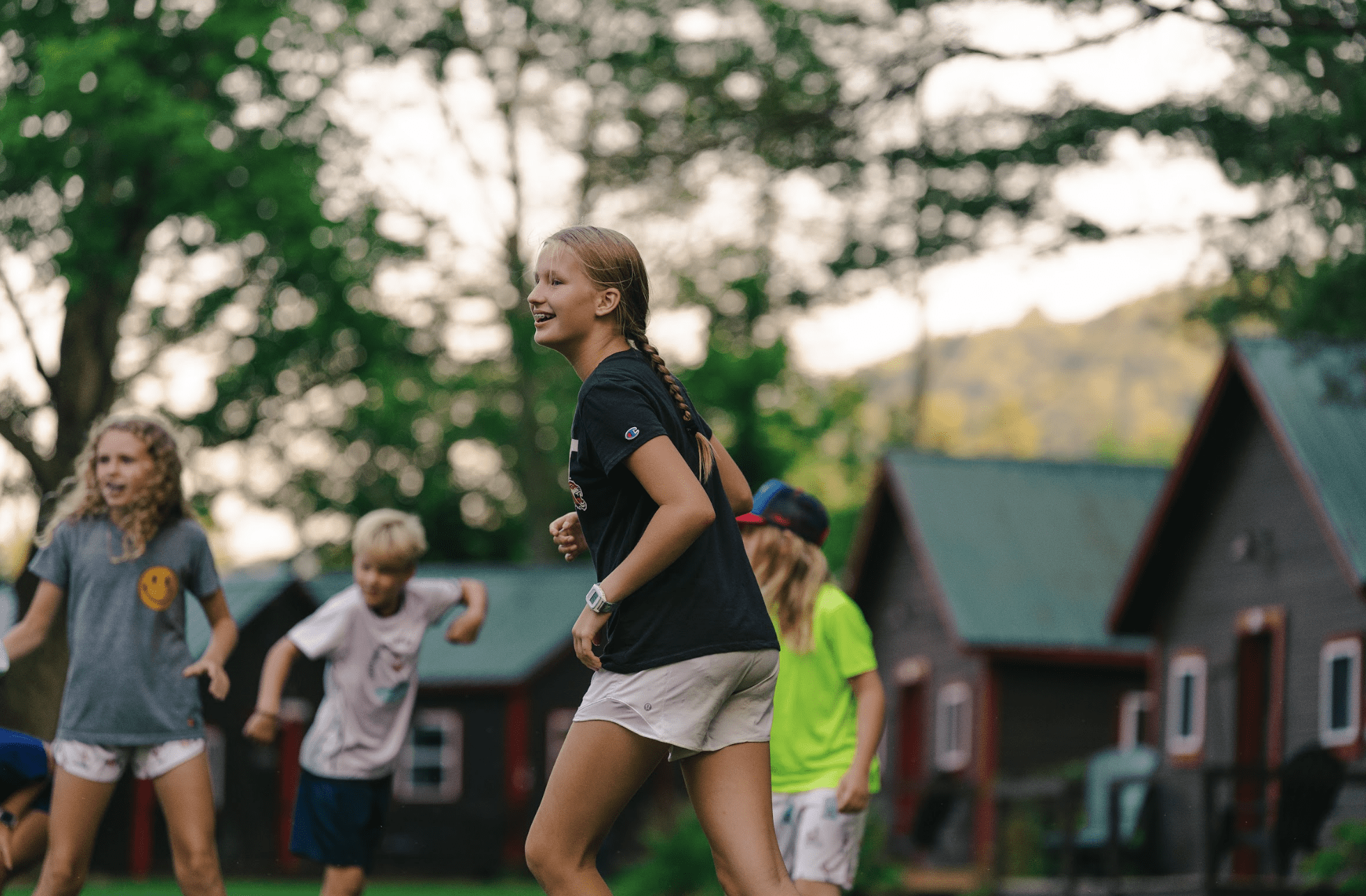 Campers bonding during evening activities at overnight camp