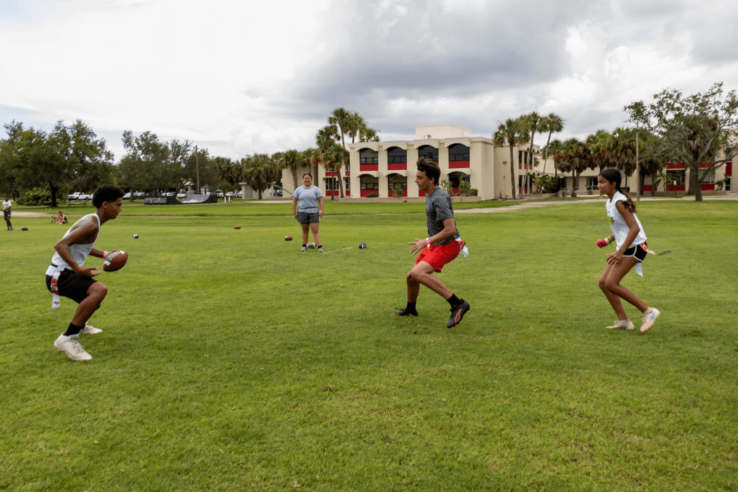 Group of boys during flag football scrimmage at Signature Sports Camps