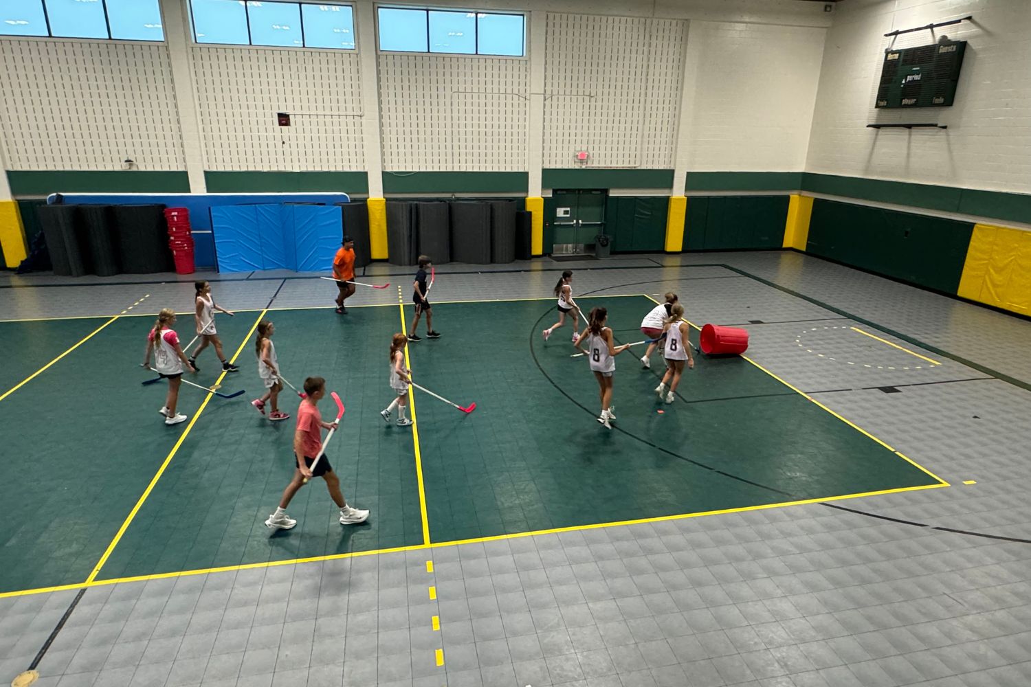 Aerial photo of campers during indoor field hockey practice