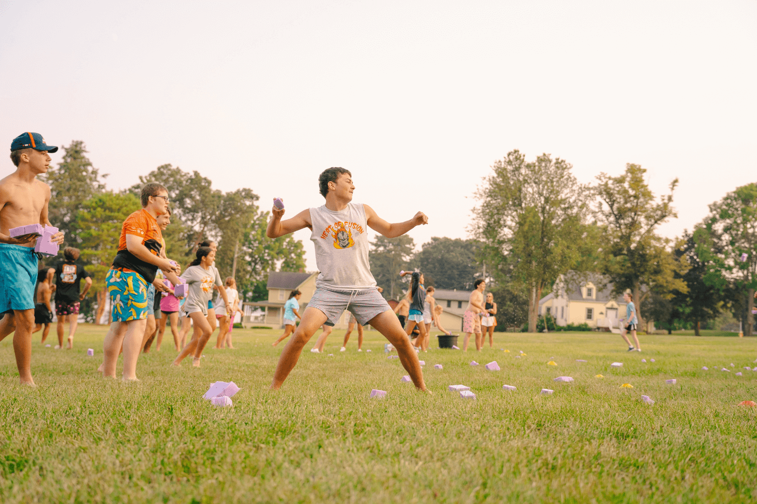 boys playing medicine man on a field at sports camp