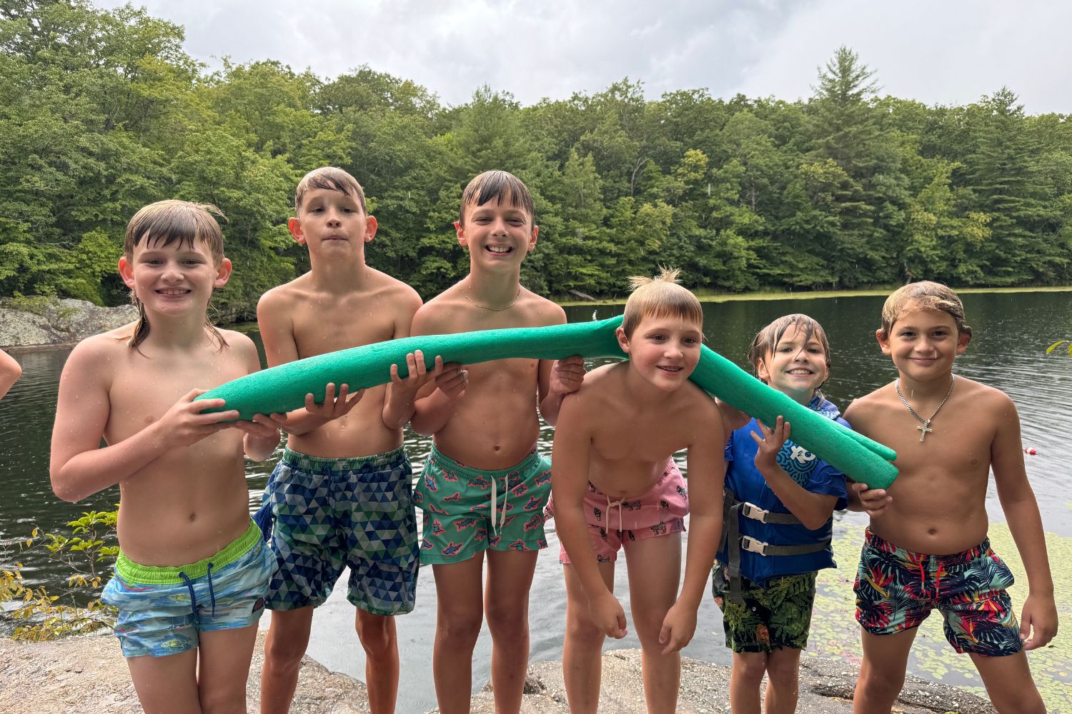 Boys group photo at the lake