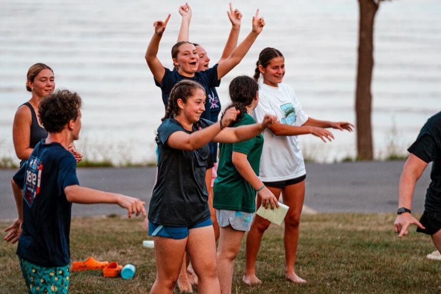 Campers celebrating during a game of Medicine Man