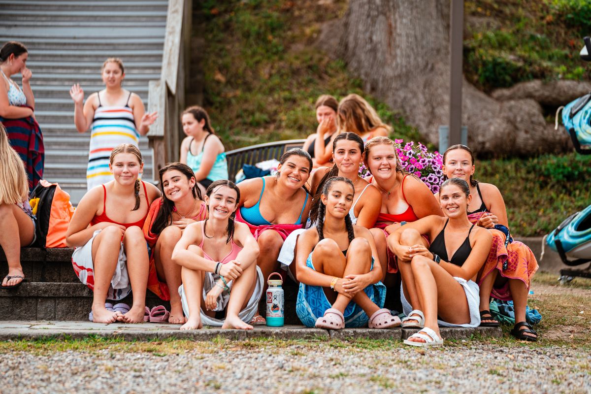 Girls at summer camp pose for a photo together