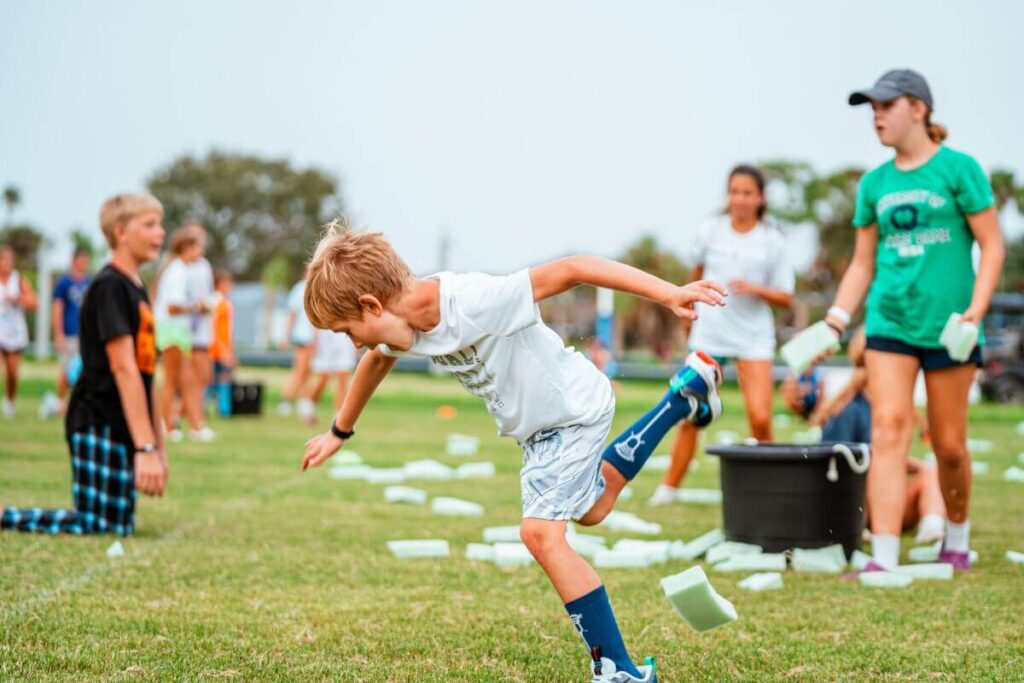 campers playing medicine man during overnight sports camp