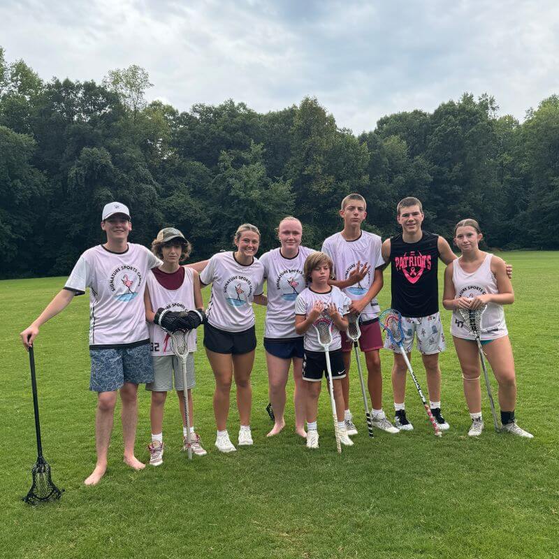 Signature Sports Camps resident coaches with a few lacrosse players at their Tennessee Camp location