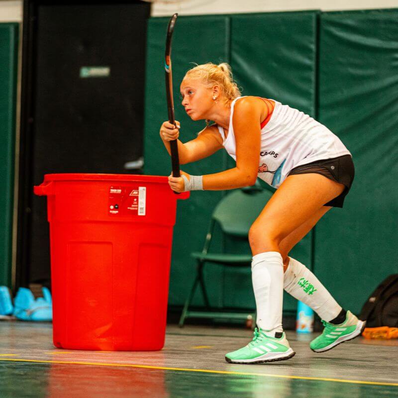 Young girl at signature sports camp during field hockey competitions