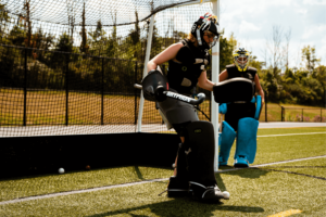 Field hockey goalie during practice at Overnight Sports Camp in Upstate New York