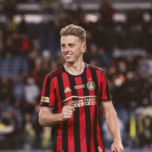 Laurence Wyke, Professional Soccer Player on the field after a goal with the Atlanta United.