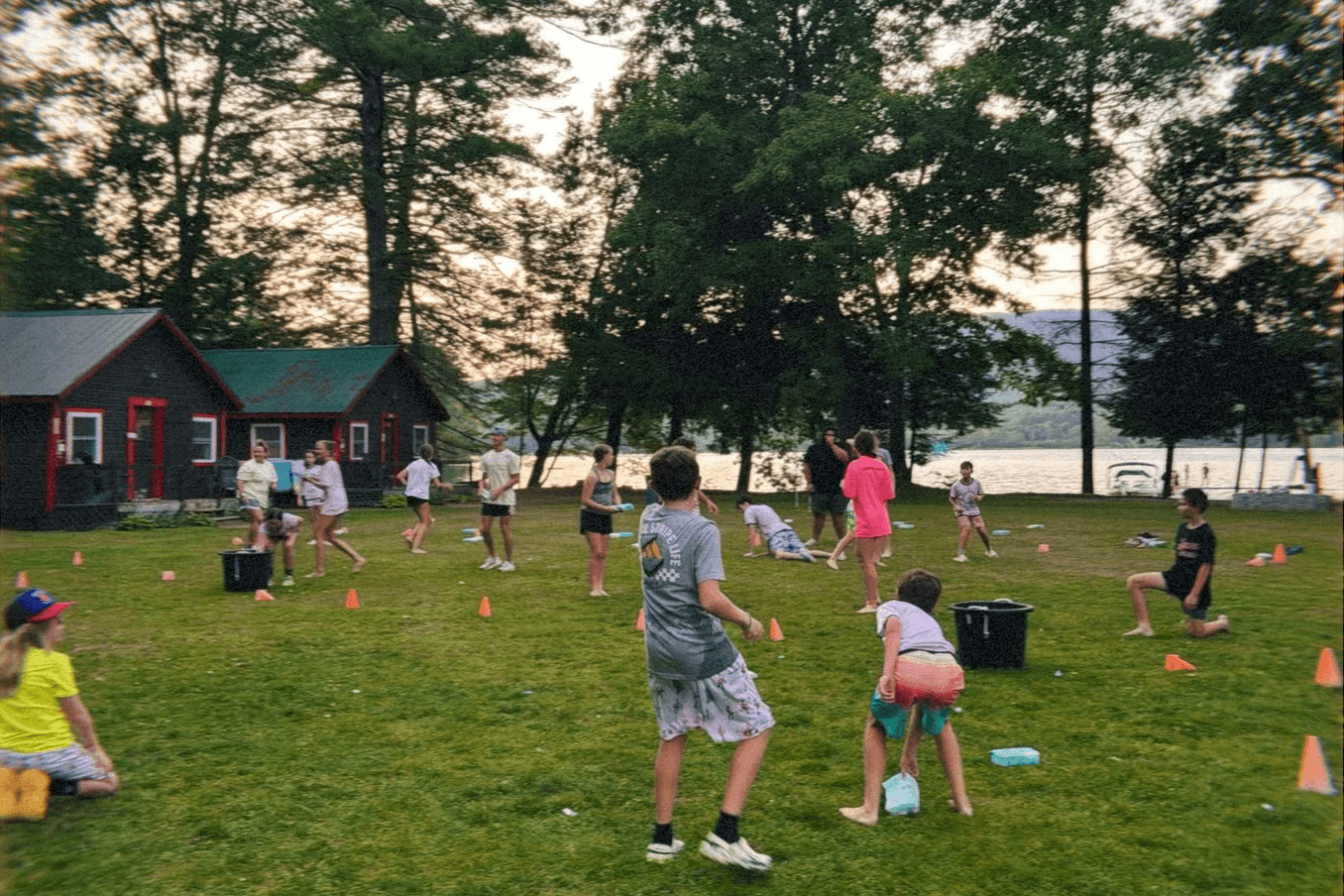Kids at sports camp playing medicine man on the field
