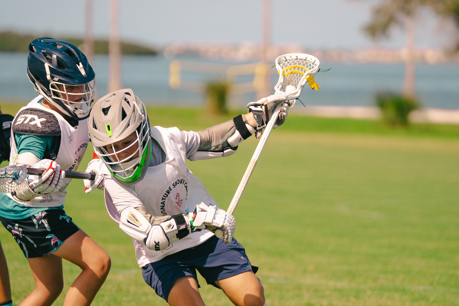 boys lacrosse practice at overnight sports camp in florida