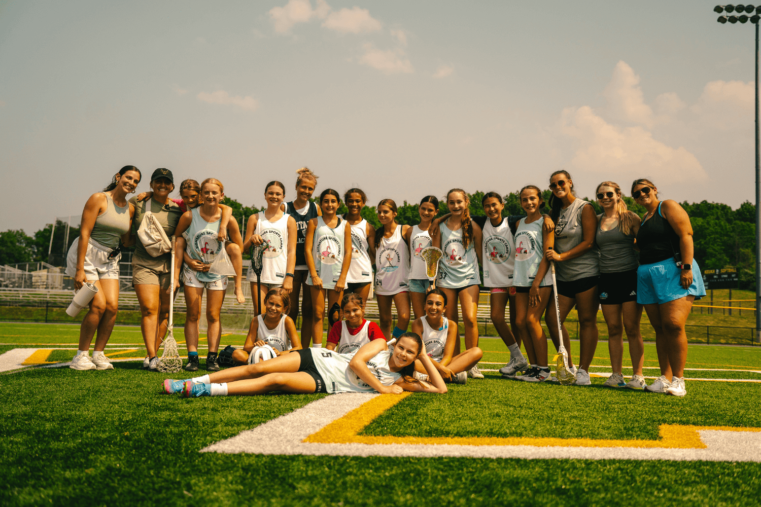 group photo of lacrosse players at overnight sports camp