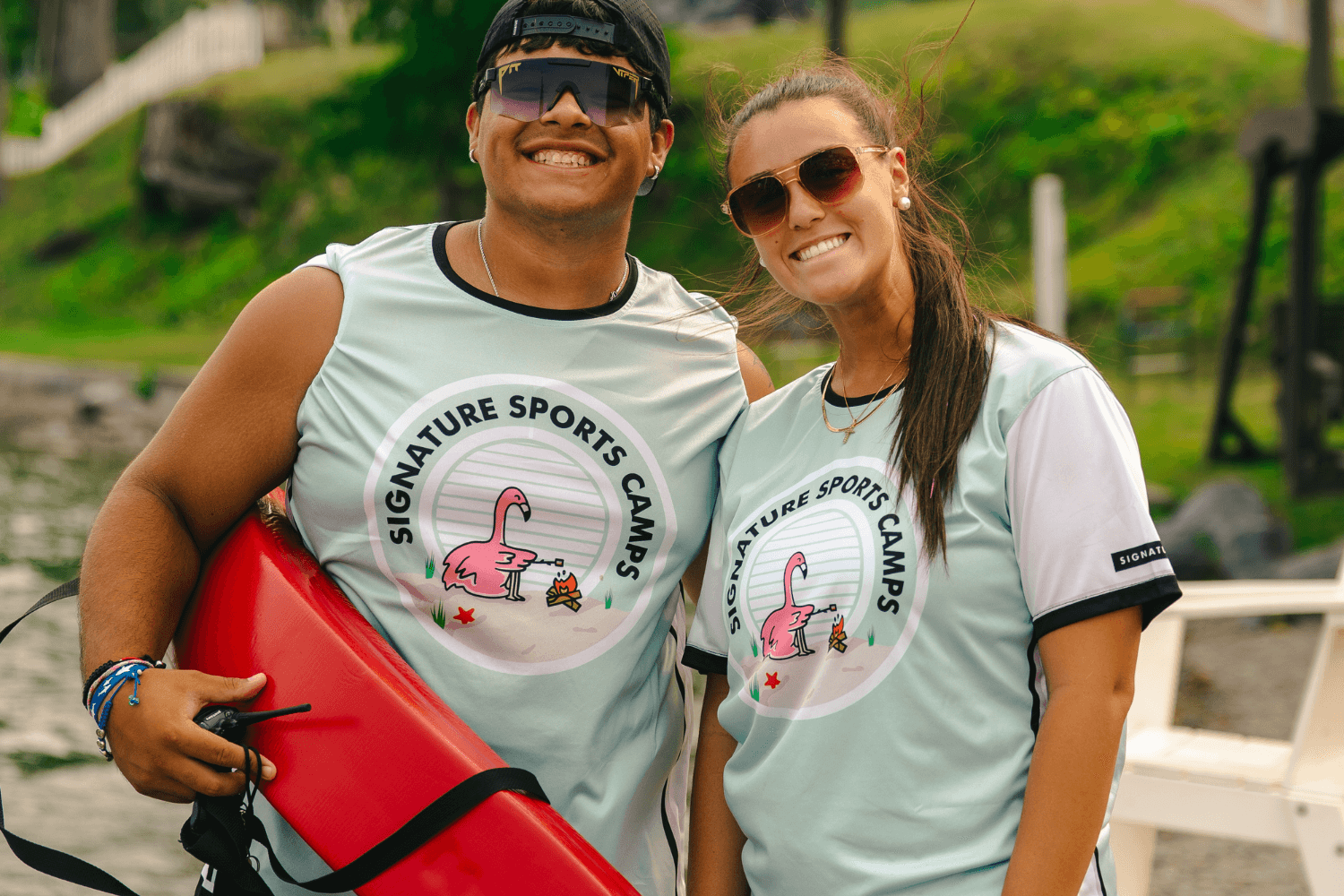 counselors smile for a photo at overnight sports camp
