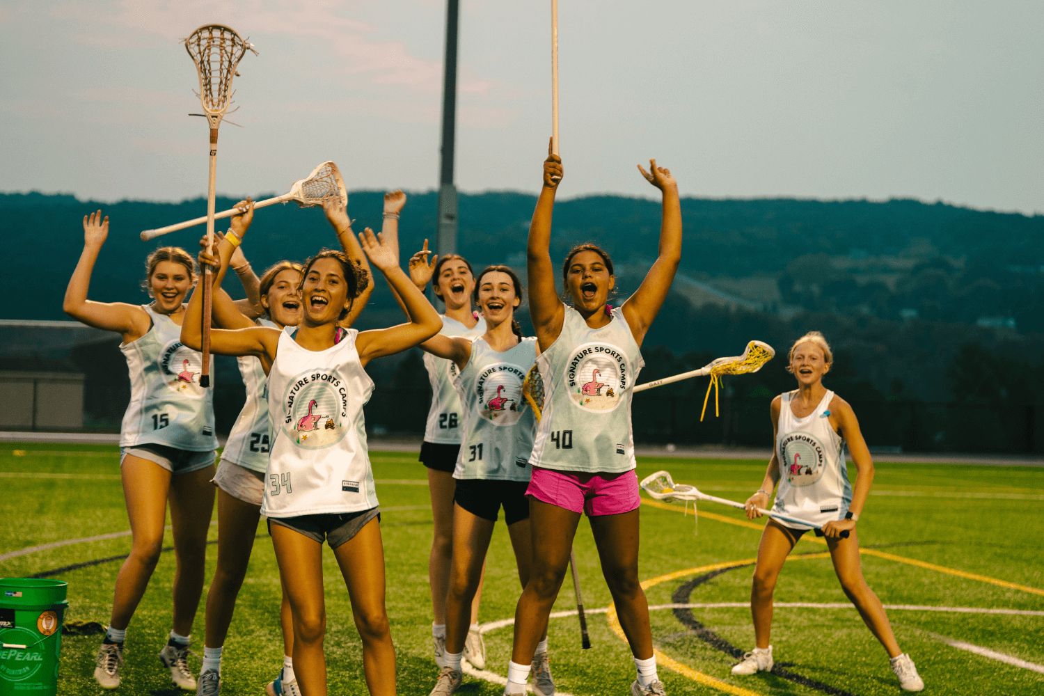 girls cheer in celebration of a win at overnight sports camp