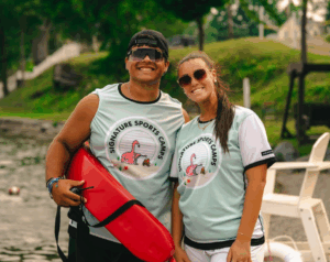 Certified lifeguards at Signature Sports Camps ensuring camper safety at the waterfront area.