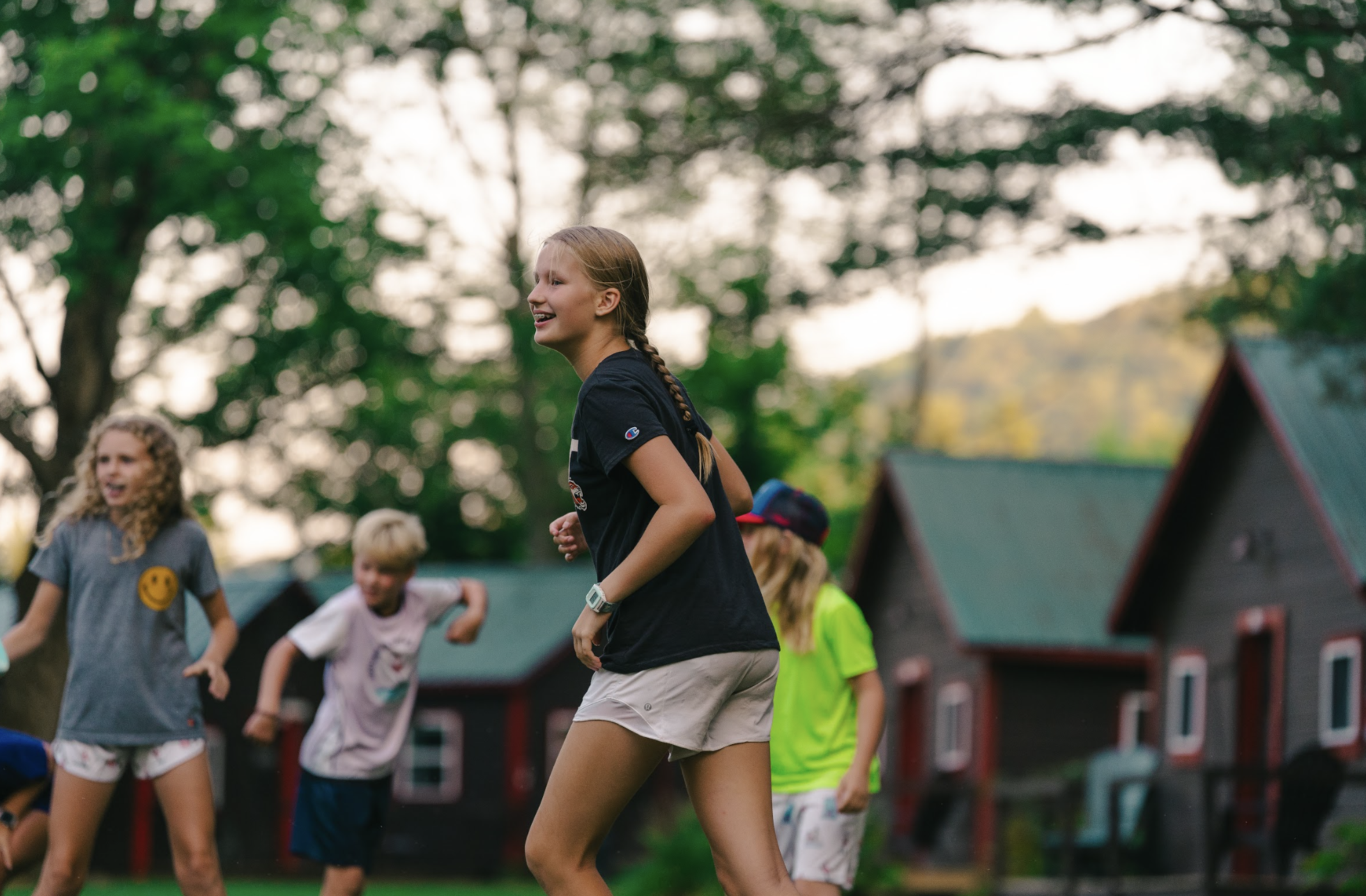 Campers bonding during evening activities at overnight camp